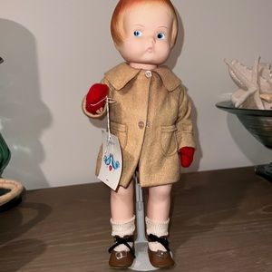 Effanbee Patsy doll on stand with tag